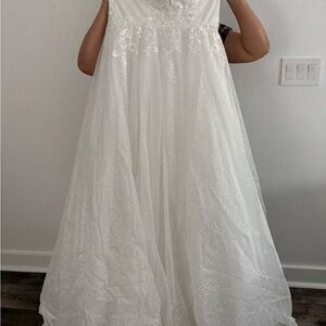 Elegant White Gown with Floral Details